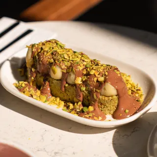 Pistachio kunafa drizzled with milk chocolate